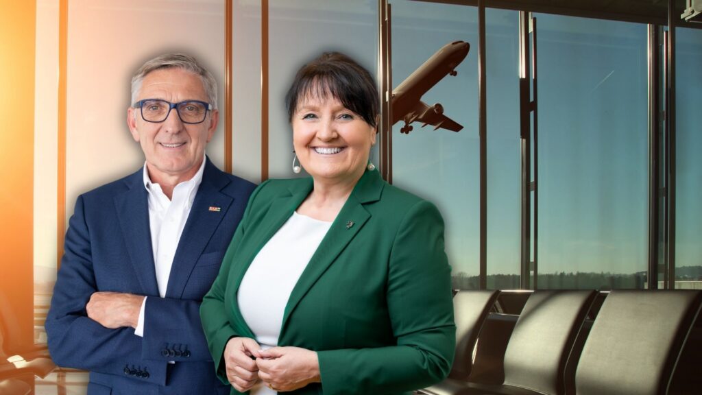 Präsident Obmann Josef Herk gemeinsam mit Manuela Khom mit einem Flughafen im Hintergund.